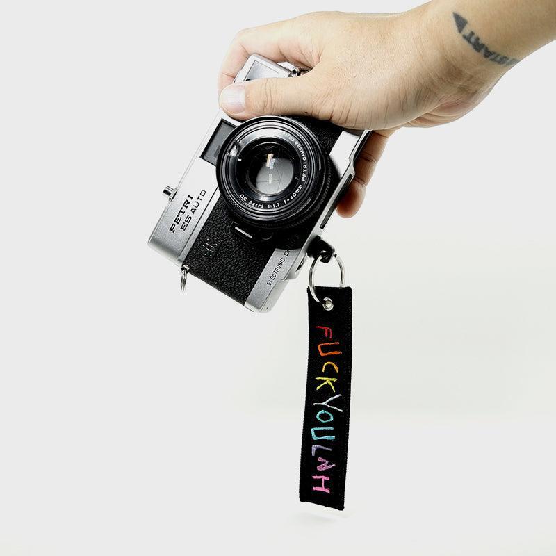 FlabSlab - 'FUCKYOULAH' Camera Tag - 8storeytree
